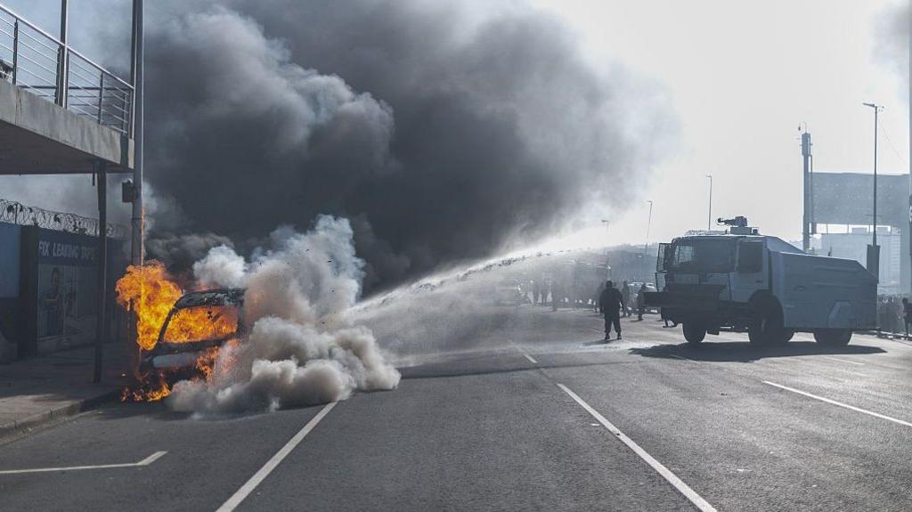 Violent Protests Erupt in South Africa as Migrant Shops Targeted