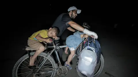 Gaza City Families Flee Amid Intensified Israeli Bombardment