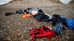 Fourteen smuggler suspects tried in Paris over Channel disaster