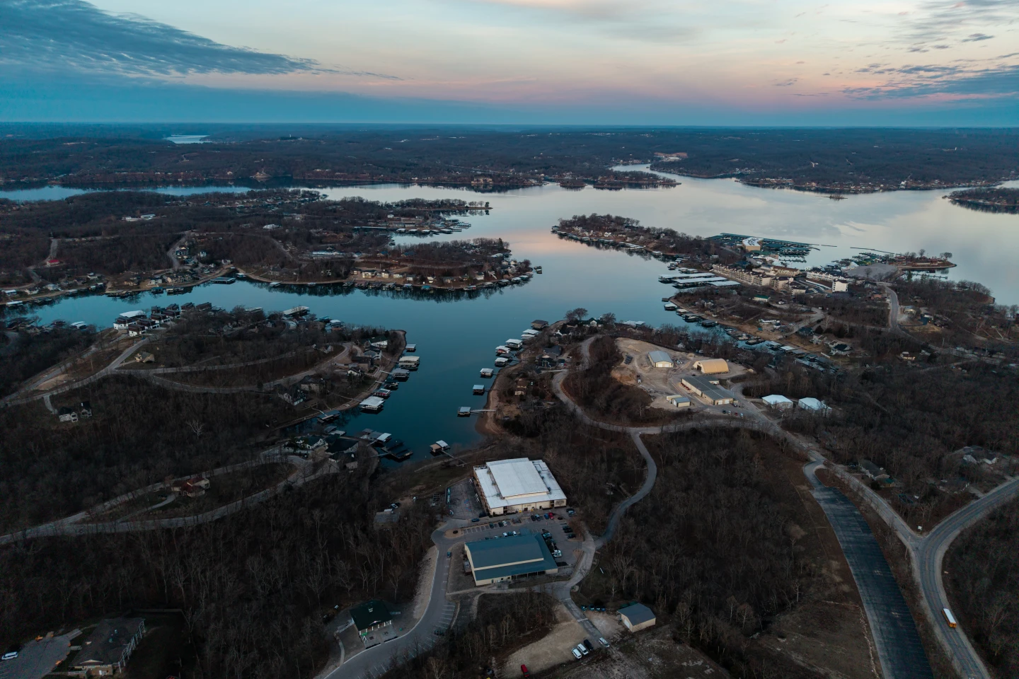 Lake Ozarks Facility Sparked Debate Over Quality of Care for Adoptee Teens","description":"An investigative piece on how a for‑profit youth treatment center marketed as a lifesaver has faced serious allegations of neglect, abuse, and regulatory gaps.","summary":"The article examines Calo Programs—also known as Change Academy at Lake of the Ozarks—a setting that advertises itself as a healing, dog‑therapy‑focused camp for adopted children in distress. Official statements tout dramatic outcomes and high revenue, yet the Associated Press investigation reveals frequent law‑enforcement calls for assaults and runaways, questionable staff training, possible abuse claims, and repeated complaints about neglect and lack of academic support. State agencies that pay funds for the program have noted insufficient oversight and have repeatedly warned the facility. The piece presents perspectives from parents, former employees, local government, and regulators, offering a comprehensive view of this controversial industry and its impact on the youth it claims to serve.","image":"https://example.com/lakeozarks.jpg","text":"At the edge of rural Missouri’s Lake of the Ozarks lies a sprawling campus that, on the surface, resembles a scenic summer retreat. Calo Programs, officially billed as Change Academy, promises families relief for children whose paths have become tangled: trapping the wounded hearts of adopted teens with golden‑retriever companionship, prescribing “joyful” care and heartfelt staff support.\n\nThe company’s messaging ruffles the black‑and‑white of its mission: “To serve the hardest‑to‑treat cases, the students and families that the broader system has given up on.” In headlines and marketing, Calo sells hope—a summer‑camp version of mental‑health care that seems almost too good to be true.\n\nBut a deep‑dive by the Associated Press reveals a far more complicated tableau. Law‑enforcement officers frequently respond to Calo with calls about student assaults or runaway incidents. State agencies that fund the facility—including Illinois, New Hampshire, and Missouri—have sounded alarms at training, transparency, and safety standards. A chorus of parents and former employees describe little in terms of consistent academic programming or treatment; the staff are “young, poorly trained” and over‑extended.\n\nThe allegations are serious. One case in the summer involves women asylum seekers who seemingly fled the campus and reacted destructively in traffic; another sees children reportedly high on meth, a claim the company has dismissed. There have been reports of students “storming” rooms, of one child’s near‑fatal jump from a roof, and a bishop’s clerk who admitted that the safety protocols were set in place only when violence already had surfaced.\n\nThe industry, of which Calo is a pillar, is a loosely regulated network of proprietary boarding centers, wilderness programs, and residential schools that quietly “institutionalizes adopted children at extraordinary rates.” The AP’s investigation shows that adoptees are up to ten times more likely to end up institutionalized than the general population.\n\nIn 2007, the campus began with 40 beds; today, it holds 144. It has branded itself as a leader in “adoption‑trauma” work, noting that 90% of its clients are adopted. Many of these children are diagnosed with reactive attachment disorder—a diagnosis many experts view as overstretched.\n\nThe company’s revenue narrative is telling. What was once largely private pay has been shifted to a model that relies on third‑party reimbursements: private health insurers, Medicaid, and wide‑spanning government programs for child welfare, school districts, and juvenile justice. For the past decade, Illinois has poured more than $35 million into the facility. Calo’s private‑equity backer, Alex Stavros, oversaw a 40‑fold increase in revenue to $180 million. The company’s modern marketing even includes a 2014 conference session titled, “Show me the Money.”\n\nDuring the COVID‑19 pandemic, Calo kept admissions high enough to avoid the steep drops many other centers experienced, all while dealing with allegations of sexual assault involving a 9‑year‑old Haitian boy whose stay was financed by Illinois education funds. The boy’s mother later accused Calo of failing to investigate and to console her.\n\nThe facility’s own defensive statements paint a contrasting image. In public statements, Calo claims it meets all required incident‑reporting protocols, uses “rigorous, continuous external oversight” and that its teens leave “with the tools they need.” Their CEO, Nicole Fuglsang, once speak at an industry conference about “diversifying revenue.” The company maintains its marketing is an essential outreach to reduce stigma.\n\nA CO‑operative vow from the Missouri Department of Social Services, however, shows a divergent reality. Years ago, a mandate was issued to Submit five missing files. A company official later translated that “Calo needs to change its practice as it is not currently working.” The same state agency has repeatedly acknowledged incomplete reporting of serious incidents.\n\nEven indirect regulators have expressed concerns. In 2024, an Illinois team of five nursing officials, dispatched for their first reported inspection, found large gaps: a “drum circle” that meant nothing beyond an experimental activity. They reported the training area was limited and lacked a documented curriculum. The inspectors feared that the company’s efforts at stone‑walling standards were intentional.\n\nEmployees have started leaking internal documents describing a system that treats mental‑health emergencies more like business sales funnels than evidence‑based treatment. An ex‑teacher, Dustin Wood, claimed when he raised concerns about safety and staffing shortages, the company silenced him, citing “lack of formal experience.” He noted the lack of a single student who left in better health than on arrival.\n\nThe story of one runaway escape escalated into a public ambulance‑chase scene captured by local police footage: a 15‑year‑old terrified of running away on a highway traffic, stops by a sheriff’s deputy, and is arrested voluntarily. Local law enforcement claims it signals a turning point in the facility’s accountability.\n\nThe larger adult view sees the facility as a business that thrives on public money while providing questionable care. The state agencies that pay for this business have limited oversight. Families have filed lawsuits, dragging Calo into legal scrutiny.\n\nIn conclusion, Calo Programs—an institution embodied by dog‑friendly nursing and promises of positive change—makes an incongruous intersection between hope and neglect. The blame revolves around ambiguous regulation, private‑equity interests and an industry, by virtue of sensational advertising, still kept far from plain‑view oversight.\n\nIn an era where mental‑health needs for youth are increasing worldwide, the Calo story rings as a cautionary vibration urging for transparency, robust regulation and real investment in long‑term outcomes for children and families.