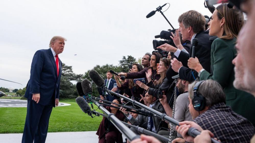 U.S. Justice Department probes TV networks over Trump pool coverage halt