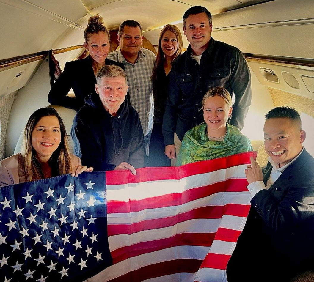 Stephen Hubbard on board a US plane after release