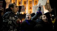 Tens of thousands rallied against Bulgaria's draft budget plan, prompting the government to withdraw it amidst aggressive demonstrations across major cities.