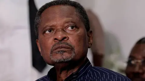 Tragic Passing of Opposition Leader Anicet Ekane Raises Concerns in Cameroon