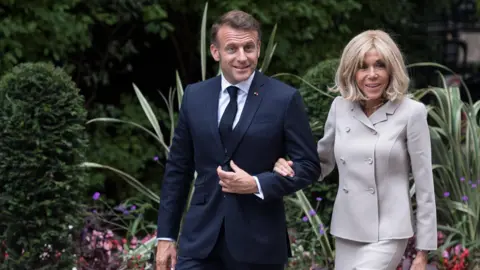 Macron Couple Plans to Present Evidence in Court Over Gender Allegations