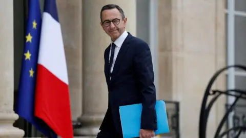 France Revises Commitment on Migrant Boat Interception Amid Political Unrest