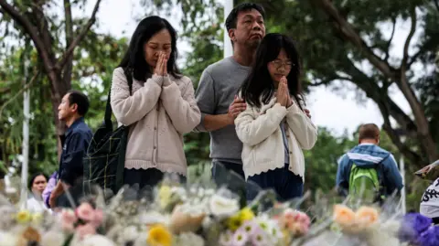 Tragic Toll of Hong Kong Fire: 146 Lives Lost as Community Unites in Mourning
