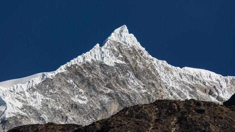 Collapsed glacier may have triggered Nepal‑Tibet flash flood, scientists say